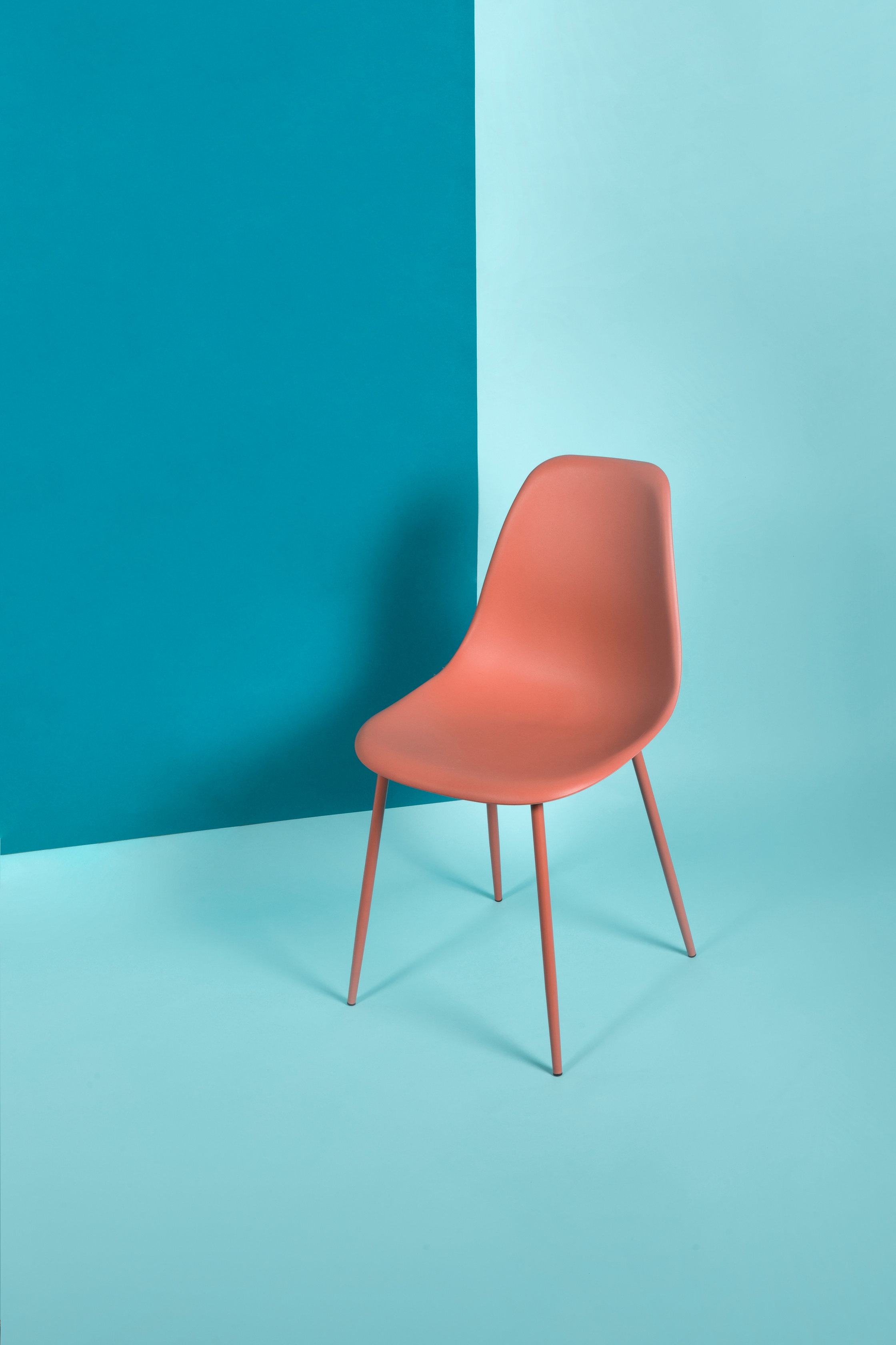 Orange Chair on Blue Background
